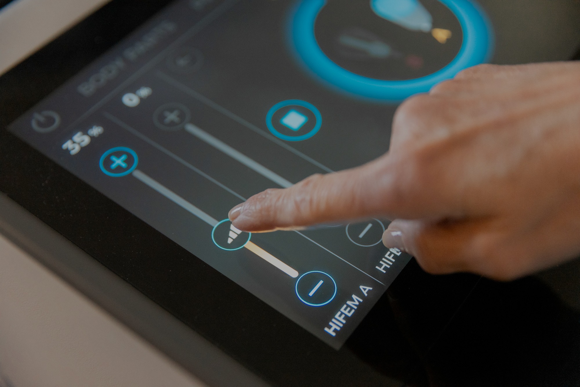 Close-up of touchscreen settings on a body contouring device at Catara Med Spa in Algonquin, IL.