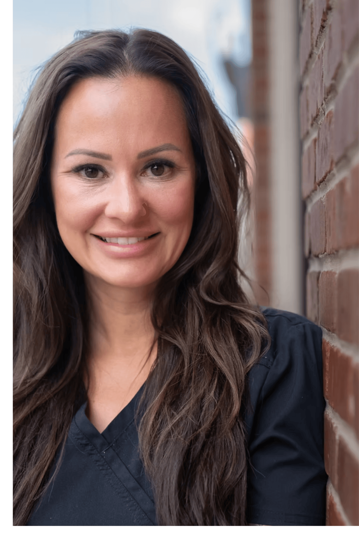 Stefanie Drozd, nurse practitioner and medical director at Catara Med Spa in Algonquin, IL, in black scrubs